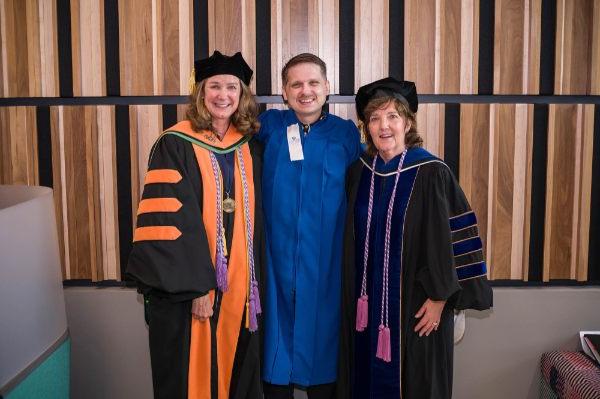 From left are Tricia Thomas, KCON dean and professor; Ben Weissenborn; and Janet Winter, KCON associate dean for undergraduate programs, at the college's recognition ceremony held August 5 on the Health Campus.