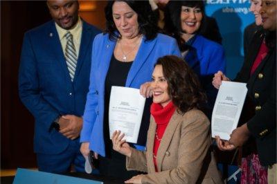 Governor Gretchen Whitmer signs a supplemental funding bill which allocates funds toward the development of GVSU's Blue Dot Lab.